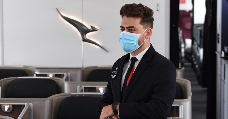 SYDNEY, AUSTRALIA - OCTOBER 28: A Qantas cabin crew member on board a Boeing 787 Dreamliner aircraft during a media visit on October 28, 2021 in Sydney, Australia. Australia's international borders will reopen from Monday November 1, with fully vaccinated international arrivals able to travel into New South Wales and Victoria without needing to quarantine. Australian citizens will also be able to freely travel overseas from 1 November without requiring an exemption from the federal government and Border Force. (Photo by James D. Morgan/Getty Images)