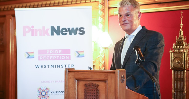 Equalities minister Stuart Andrew speaking at the PinkNews Westminster Pride Reception