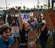 LGBTQ rights supporters protest against Florida Governor Ron Desantis outside a "Don't Tread on Florida" tour campaign event.