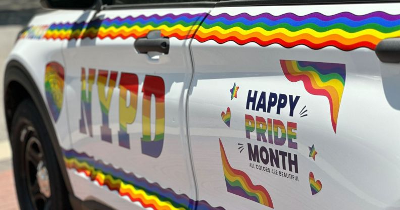 A picture of a NYPD police car decorated in rainbows and colourful designs to celebrate LGBTQ+ Pride Month