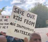 Parents hold signs up at Birchfields Primary School protest in Manchester