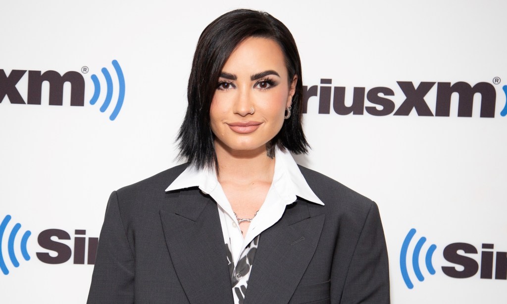 Demi Lovato shares the story behind coming out to her parents.