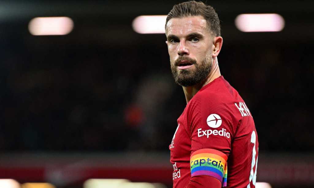 Liverpool player Jordan Henderson wearing a rainbow captain armband