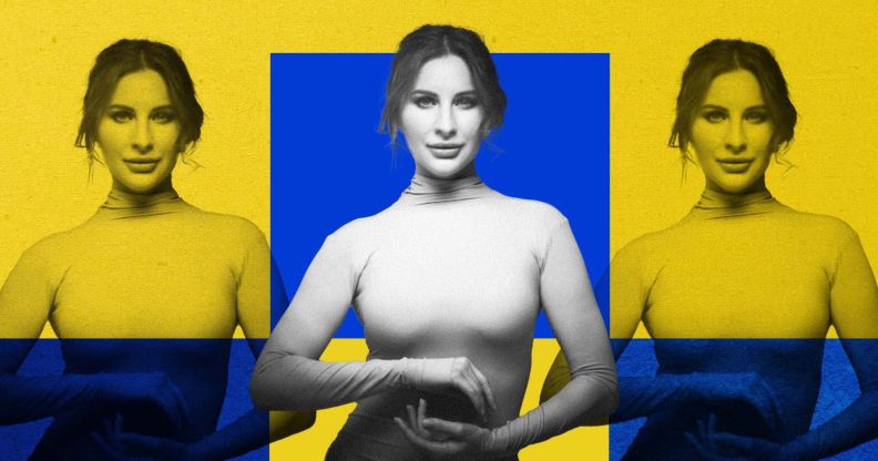 Natisa Gogol in a beige turtleneck stood against a blue and yellow background.