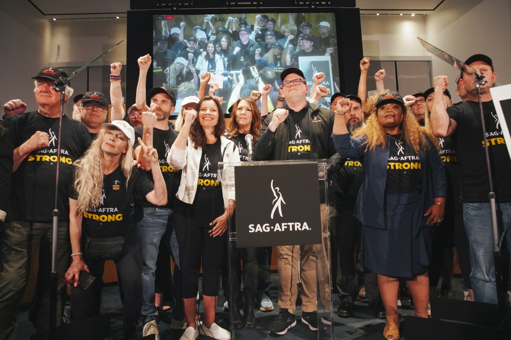 SAG-AFTRA members hold a press conference announcing strike.