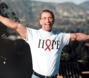 A picture of Steven Pieters, arms outstretched, wearing a Hope t-shirt.