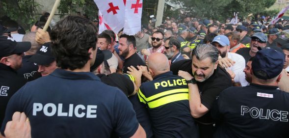 A group of anti-LGBTQ+ protestors stormed Tbilisi Pride in Georgia and clashed with authorities at the event