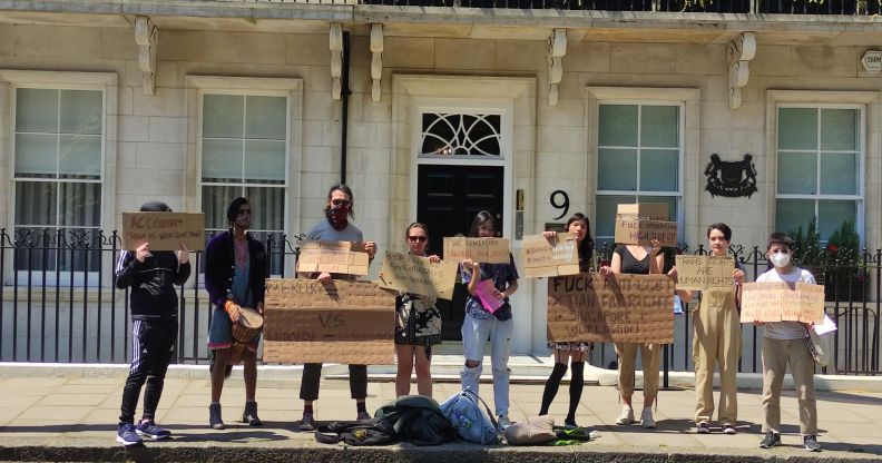 A group of people gather outside the Singapore High Commission in London, UK to protest attacks against the queer and trans people as well as the LGBTQ+ community in Singapore