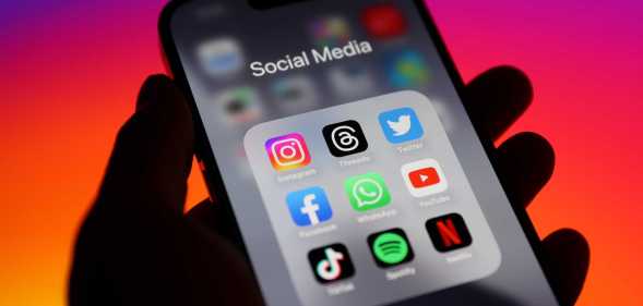 Apps on smartphone including Netflix Spotify TikTok and Instagram