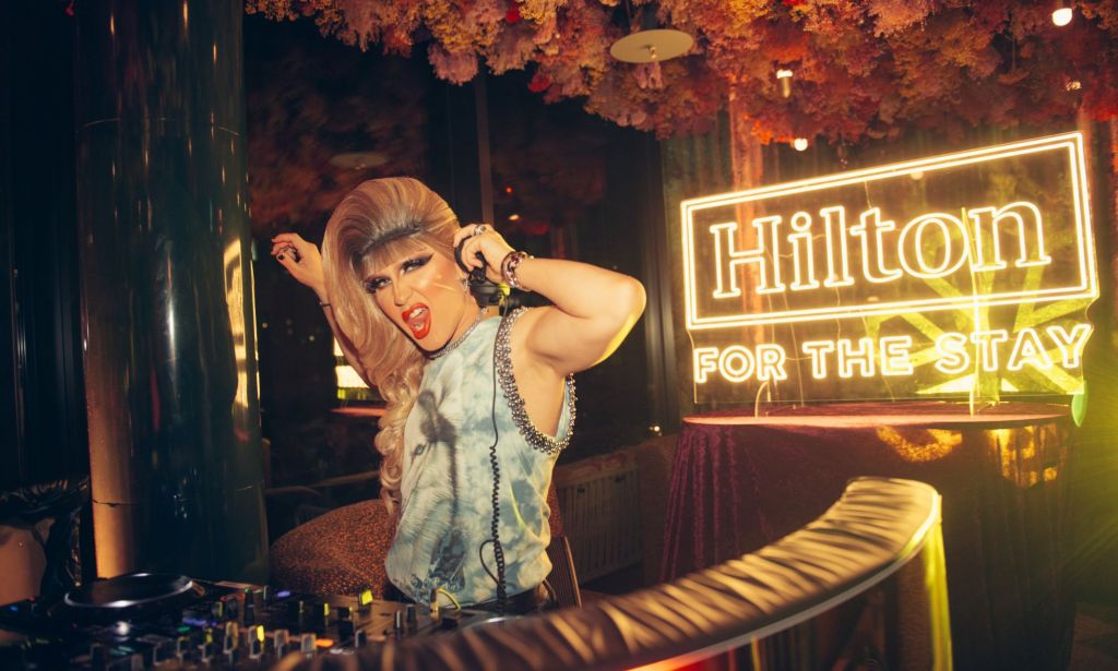 Jodie Harsh performs in the DJ booth at the Hilton Secret Socials event.