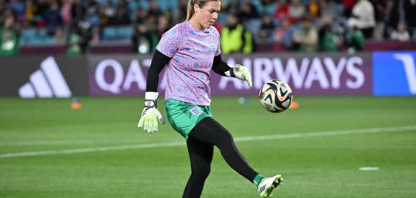 England goalkeeper Mary Earps kicks a football in an action shot