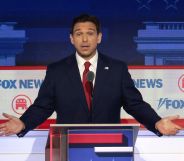 Florida governor Ron DeSantis stands behind a podium during the Republican presidential debate 2024