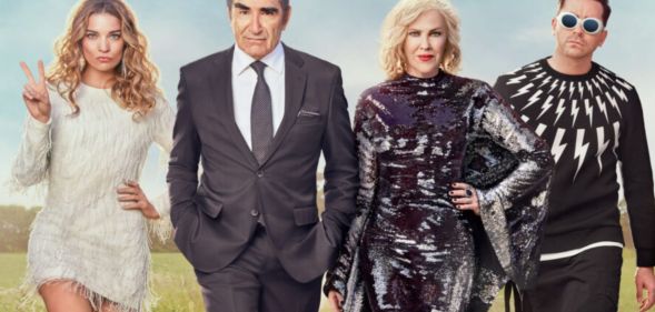 A promotional photo of Eugene Levy as Johnny Rose, Catherine O'Hara as Moira Rose, Daniel Levy as David Rose, Annie Murphy as Alexis Rose in Schitt's Creek.