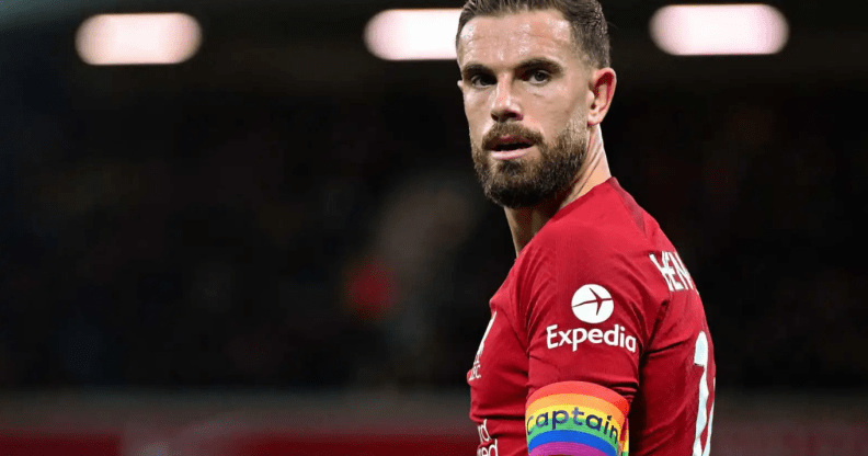 England footballer Jordan Henderson wears a red strip with a rainbow captain's armband