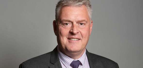 Tory deputy chair Lee Anderson pictured in his official parliamentary portrait. He is pictured wearing a suit, jacked and tie against a grey background.