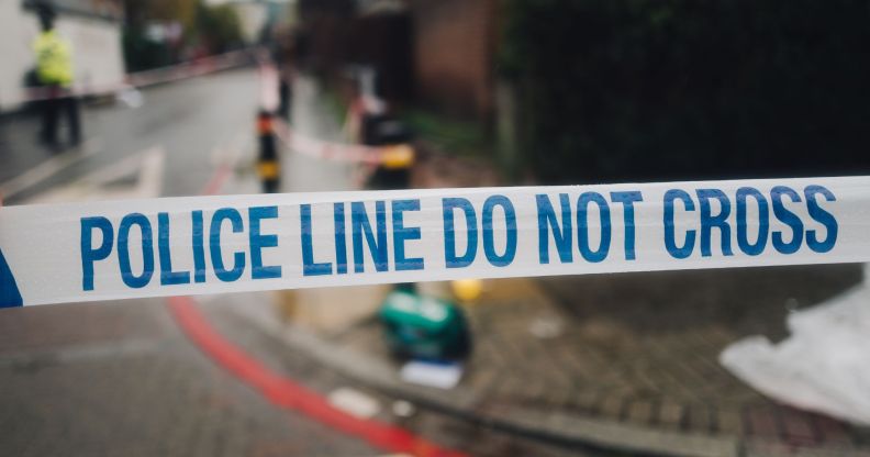 Blue and white tape with the words 'police line do not cross' is used to guard an area where a crime – whether it is a hate crime rooted in homophobia or other attack – by police