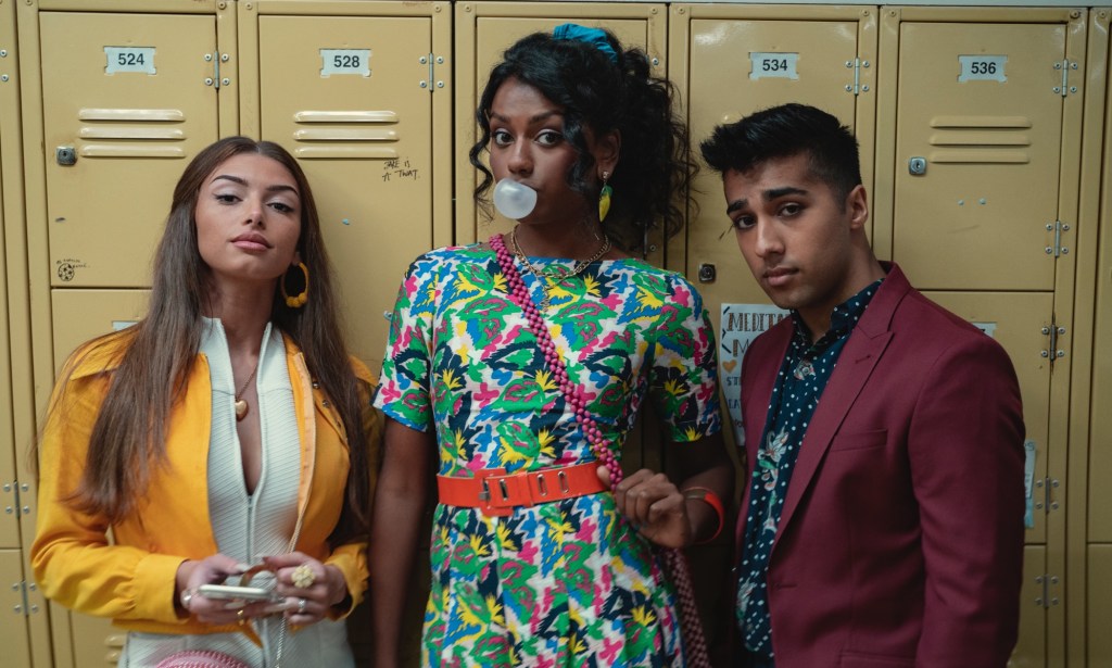 Mimi Keene as Ruby (L), Simone Ashley as Olivia, and Chaneil Kular as Anwar (R) in Sex Education.