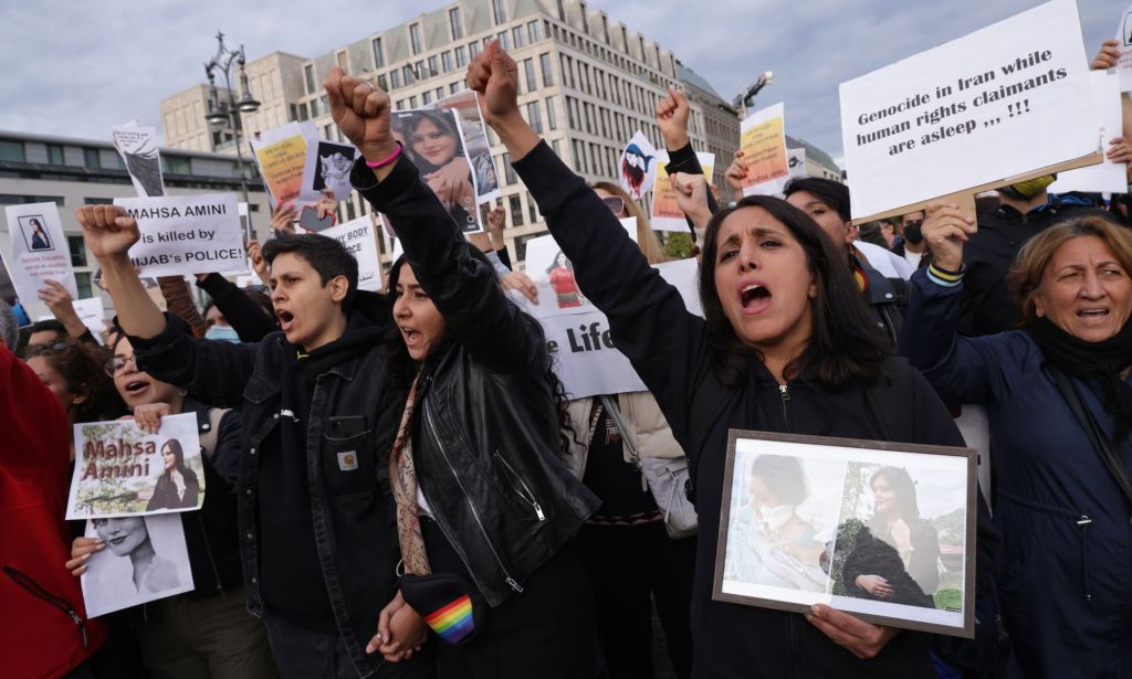 Women and LGBTQ+ people join together to protest against the death of Mahsa Amini in Iran and the Iranian government's crackdown on the rights of women, LGBTQ+ folks and other marginalised people living in the country