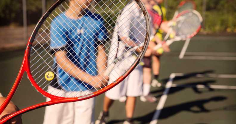 Students playing tennis.