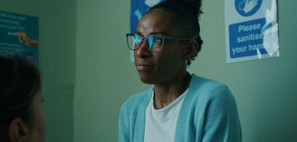 A still from the Terrence Higgins Trust advert in which a woman looks discouraged in a hospital room.