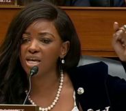 Jasmine Crocket raising her finger to enunciate a point during her speech at a Capitol Hill hearing.