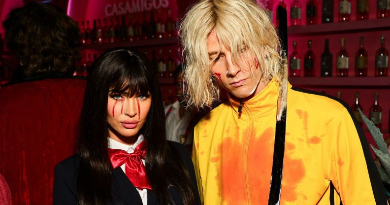 Megan Fox (left) and boyfriend Machine Gun Kelly (right) dress as Kill Bill characters for Halloween.