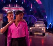 Layton Williams performs in a pink and black drag look for a Grease-inspired dance on Strictly Come Dancing