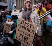 Protestors hold up signs reading 'trans rights now' and 'just another day on TERF island' as they slam the UK government for attacking the trans community as well as historically not tackling anti-LGBTQ+ hate crimes