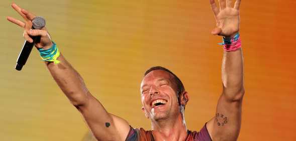 Chris Martin of Coldplay performs on stage at Optus Stadium on November 18, 2023 in Perth, Australia. (Paul Kane/Getty Images)