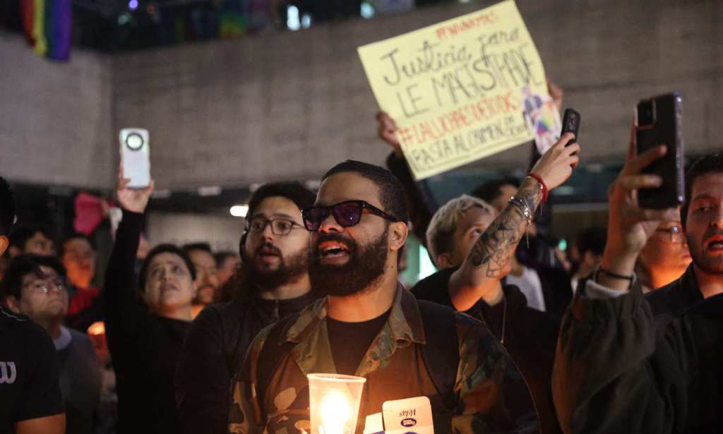 Activists gather at a candlelit vigil for Jesús Ociel Baena.