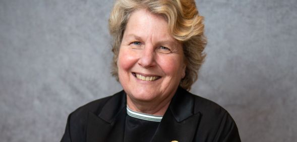 Sandi Toksvig smiling for a photo.